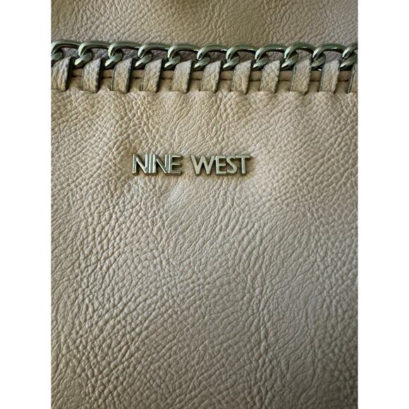 Nine West pastel pink tote with bold chained design front pocket. - Picture 2 of 9